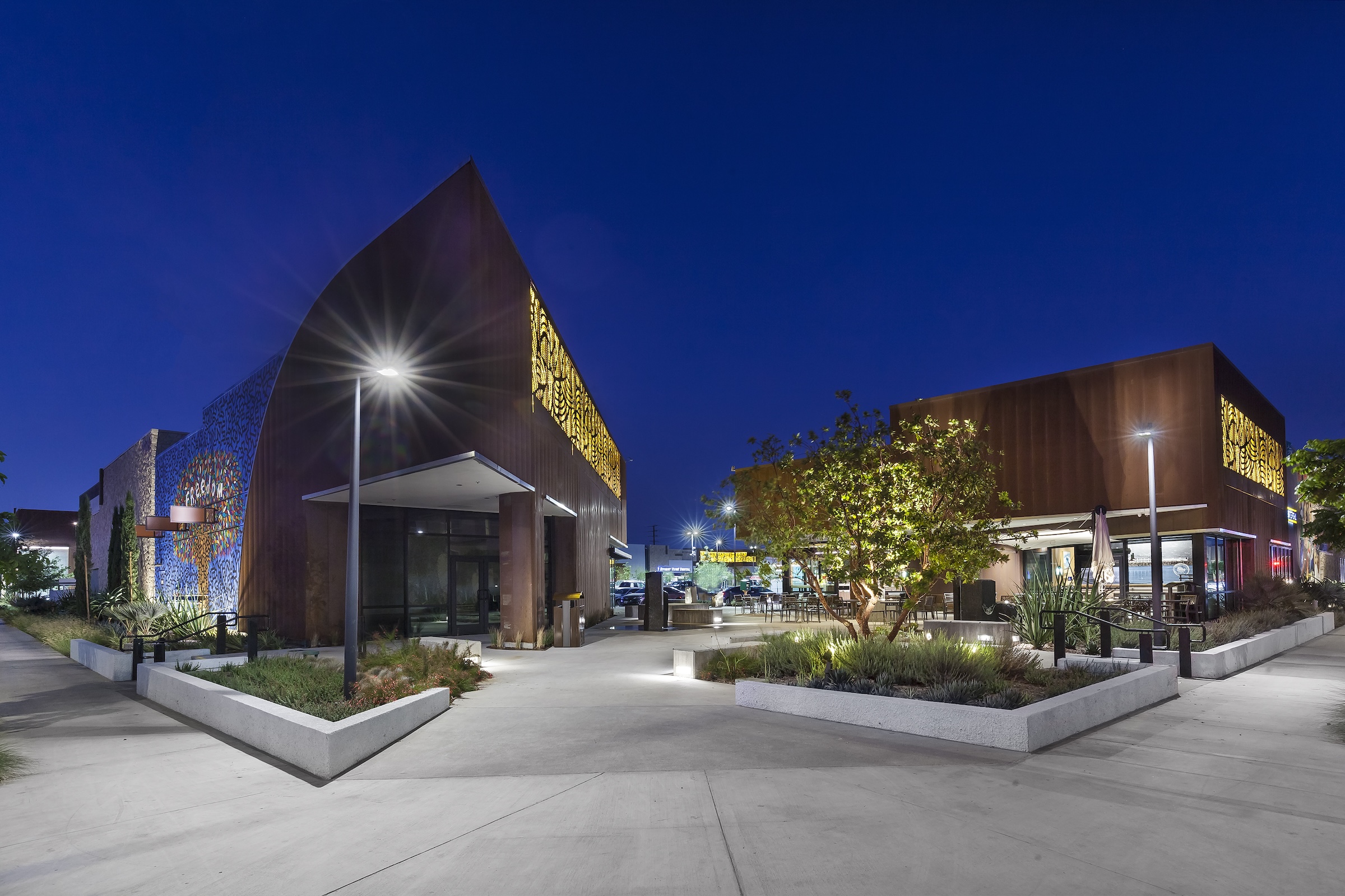 The Freedom Plaza shopping center in Los Angeles was designed to be a reflection of the people of Watts, Calif., and to serve as a community-centric gathering space.
