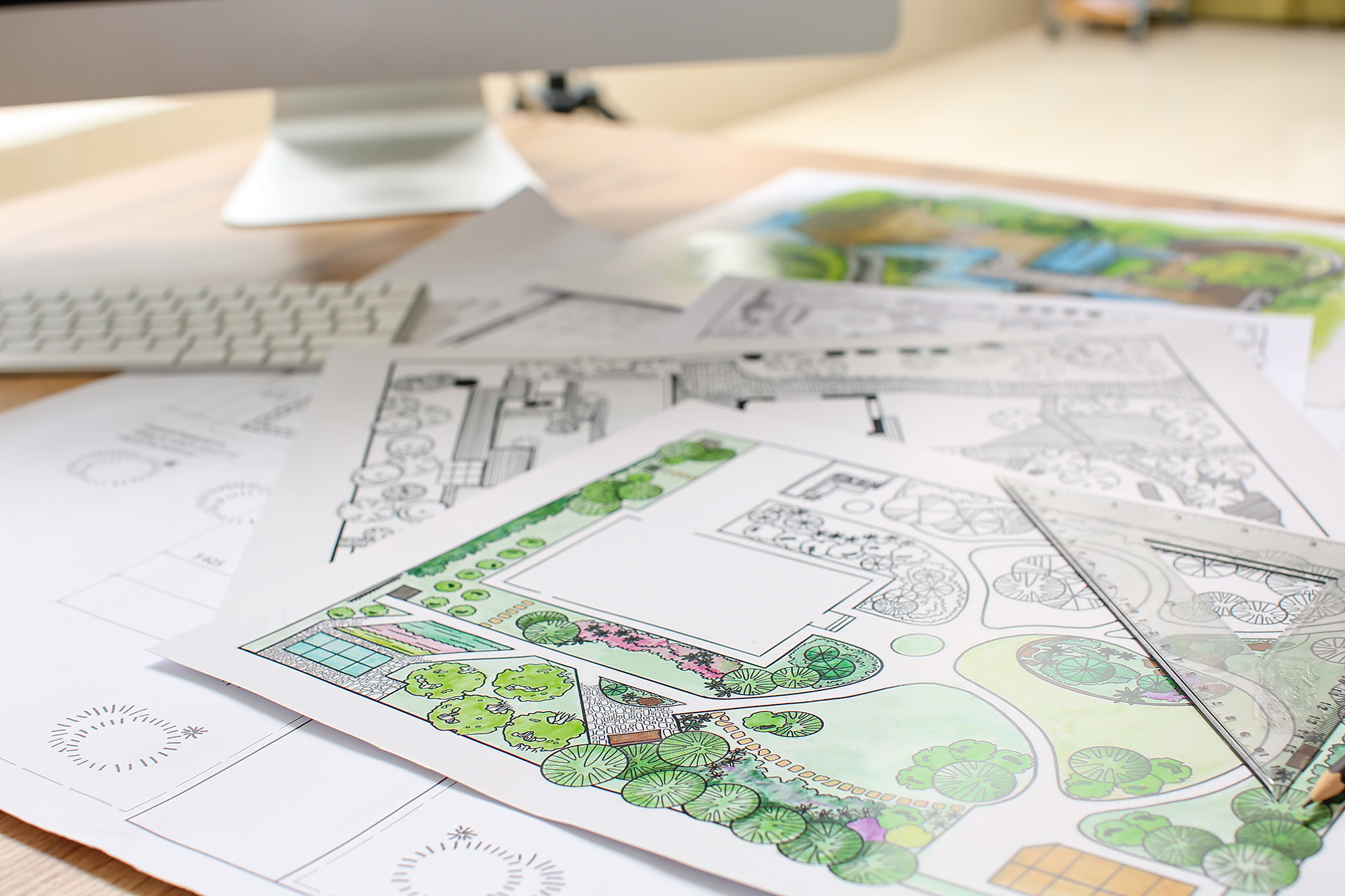 Landscape architect drawings on office desk