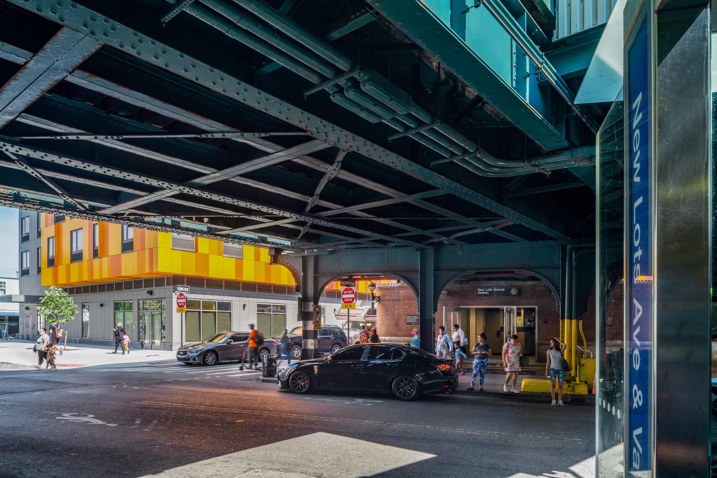 Brooklyn's colorful Van Sinderen Plaza affordable housing project includes retail, public spaces. Photo courtesy GLUCK+