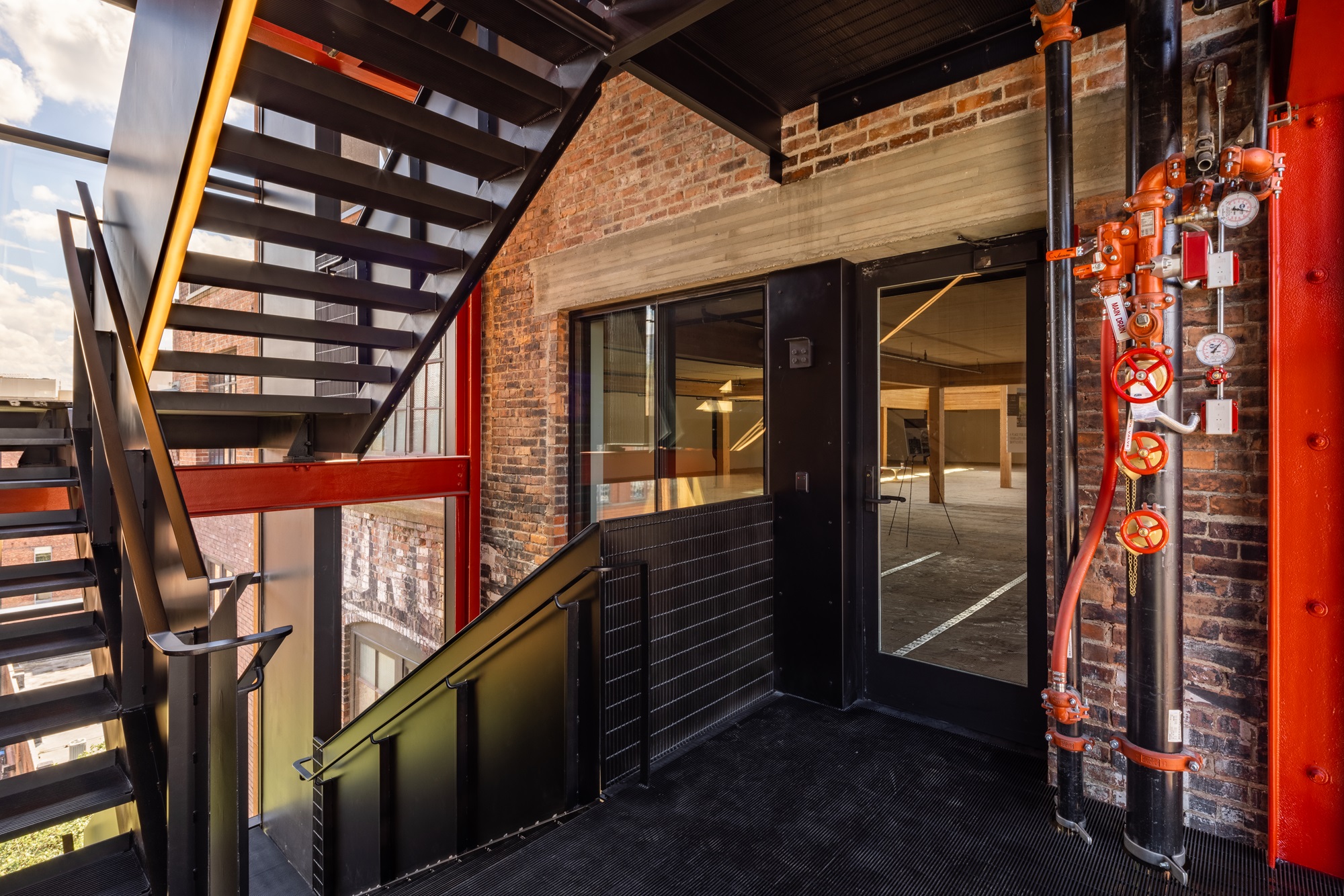 Narrow-profile, fire-rated frames support design cohesion in stairwells
