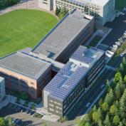 Kaiser Borsari Hall will draw 100% of its electricity from a rooftop solar panel array. Photo courtesy Perkins&Will